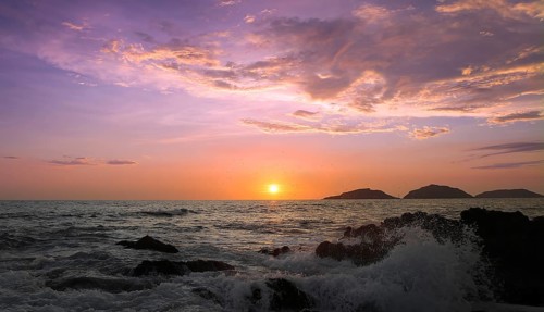 Mazatlan beaches, sunsets and scenic slow motion ocean swells and waves near Malecon sea promenade