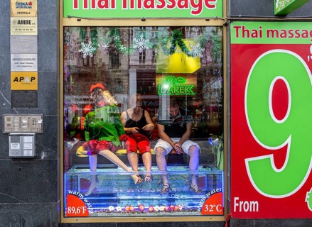 Colourful advertisement on the shop window, Thai Massage, Prague, Czech Republic, Europe