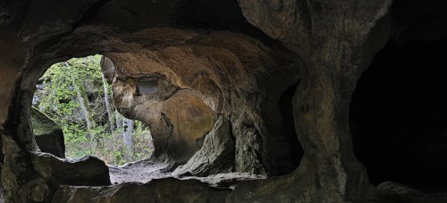 The Hohllay cave showing grooves and circles in the sandstone rock from carving millstones,