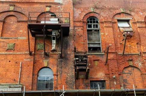 Derelict ruin of Great Grimsby Ice Factory built in 1900, Grimsby docks, north east Lincolnshire,