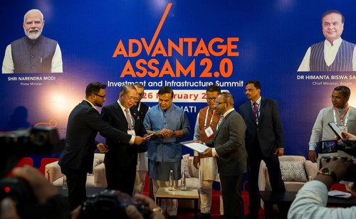 Assam Chief Minister Himanta Bishwa Sarma with investors on a MoU sign function during The