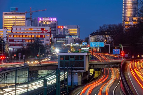 The skyline of Essen city centre, A40 motorway, Ruhr Expressway, North Rhine-Westphalia, Germany,
