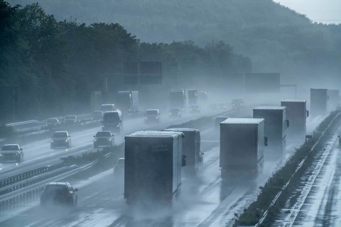A2 motorway, at Recklinghausen motorway junction, heavy traffic during a thunderstorm, North