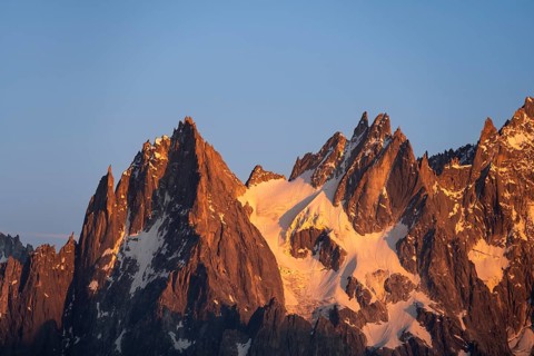Rocky pointed mountain peaks at sunset, alpenglow, Aiguille du Plan, Mont Blanc massif, Chamonix,