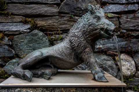 Fountain, wild boar fountain in the mountain village of Bordei, Centovalli, Canton Ticino,