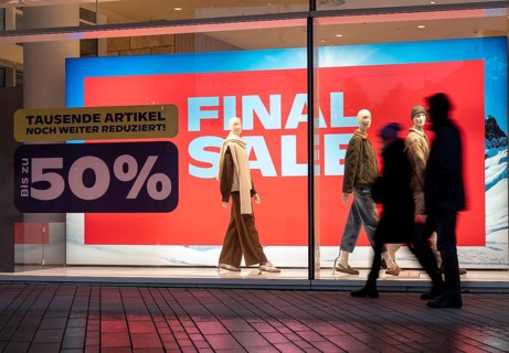 Final Sale, Clothing department stores' on Schadowstraße, large poster in the shop window