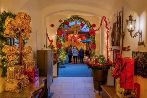 Christmas decorated passage to the mulled wine stand in the side passage at the Christmas market,