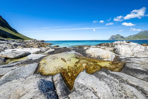 Rocky coast near Myrland, Flakstadoya, Lofoten, Norway, Europe