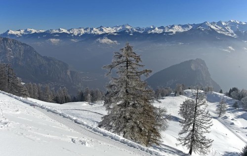 View from Alp Loutse over the Rhone valley to the snow-covered peaks of the Valais Alps, Ovronnaz,