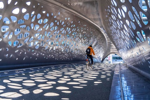Light effects from the sun in the Parkbruk, a cycle and pedestrian bridge in the city centre of