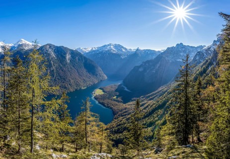 Panoramic view of the Königssee from the Archenkanzel viewpoint, autumnal forest and snow-capped