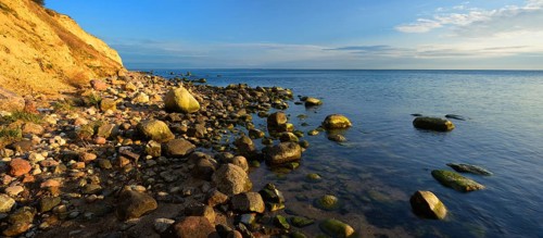 Cliffs and boulders on the coast of the Baltic Sea in the evening light, Reddevitzer Höft, Mönchgut