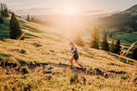 Summer trail running and hiking in the Alps on the Riedberg Pass between Obermaiselstein and