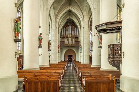 Interior and organ of the Catholic parish church of St Peter and Paul in Straelen, North