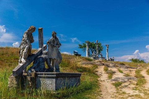 Crucifixion group close to the Windmill. Windmill Retz, located in Lower Austria. The windmill is