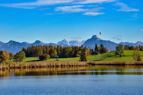 Mountain panorama at Grundweiher near Rückholz, in the background on the right Säuling (2047 m), on