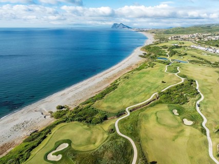 The La Hacienda Links Golf Resort at the Mediterranean Sea with the Rock of Gibraltar (British) in