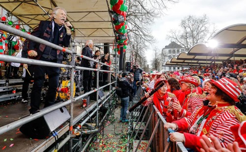 Colourfully costumed carnival revellers celebrate carnival in Cologne, on Weiberfastnacht the