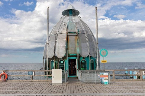 Metal pavilion at the end of a pier with sweeping sea views, Rügen