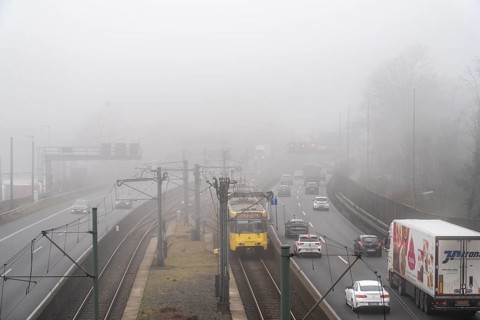 Dense fog, with visibility sometimes less than 100 metres, A40 motorway, city passage in Essen,