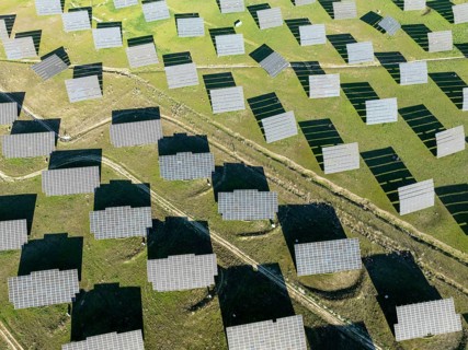 Rows of solar panels at a photovoltaic plant near town of Espejo. Aerial view. Drone shot. Córdoba