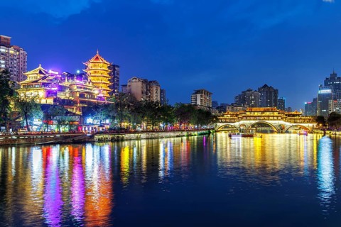 Chengdu Anshun Bridge over Jin River with pagoda at night in Chengdu, China, Asia