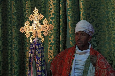 Lalibela, eastern group of rock-hewn churches, priest in the Bet Emmanuel, Emmanuel church,