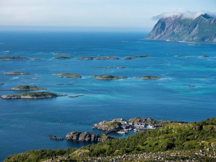View from Mt. Sukkertoppen over coast at Hamn i Senja, marina of Hamn i Senja, Senja island,