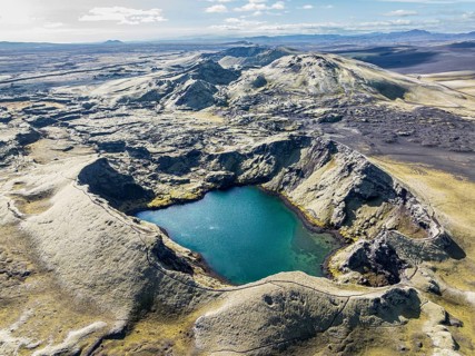 Lake in Tjarnargigur crater, moss-covered Laki crater or Lakagígar, series of craters, aerial view,