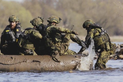 Soldiers on an inflatable boat, taken as part of the military exercise 'Wettiner Schwert' with