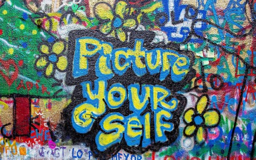 Graffiti on a wall in the Old Town, Prague, Czech Republic, Europe