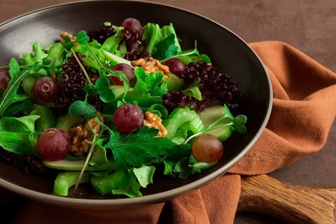 Fresh salad, waldorf, celery stalk, with apple and walnut, grapes, herbs, homemade, no people