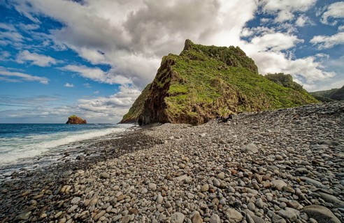 On the beach, stone beach of Calhau de São Jorge, Madeira Portugal