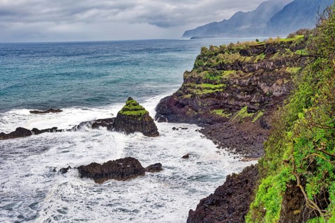 Cliffs, rocky beach and Atlantic Ocean in rainy weather, Seixal, Madeira, Portugal, Europe