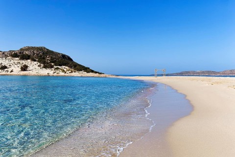 Crystal clear turquoise water, deserted dream beach in spring, Simos beach, Sarakiniko beach,