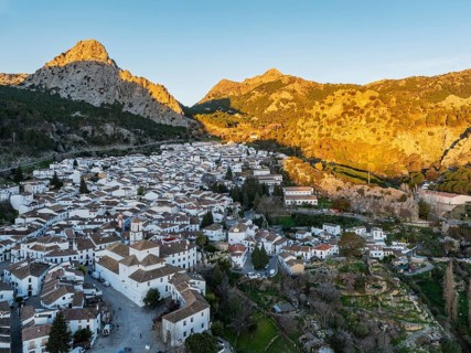 The White Town of Grazalema in the Sierra de Grazalema. Aerial view. Drone shot. Cádiz province,