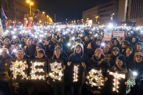 Sea of lights with Resist signs at the demonstration under the slogan Brandmauer statt Brandstifter