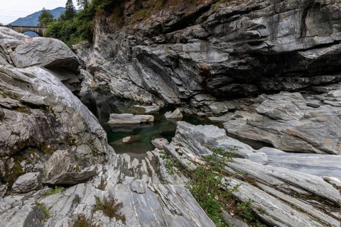 Rocks, granite rock formations in the Maggia River near Ponte Brolla, in the Maggia Valley, Valle