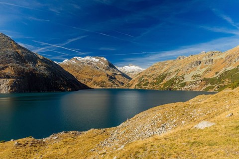 Kölnbrein reservoir on a bright sunny morning. Carithia, Austria, Europe