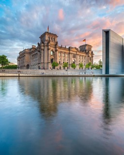 The Reichstag on the banks of the Spree in the evening light, Spreebogen, government district,