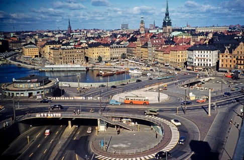 Vehicles using the new overpass system in the city centre of Stockholm, Sweden 1958, drive on the