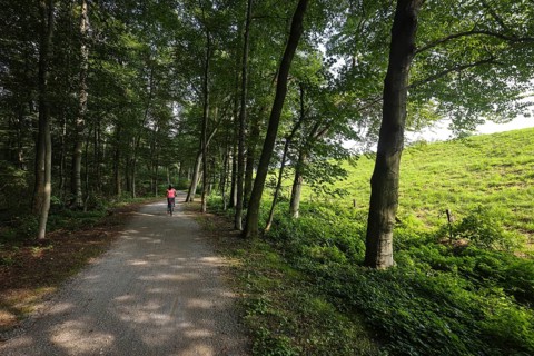 Bottrop, North Rhine-Westphalia, Germany - Cyclists ride on the Emscher-Weg, a cycle and footpath