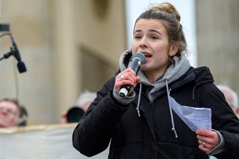 Luisa Neubauer speaks at the Fridays for Future climate strike. Brandenburg Tor, Berlin, 14