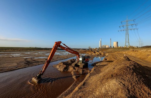 Dinslaken, North Rhine-Westphalia, Germany, New Emscher estuary into the Rhine. Excavator in the