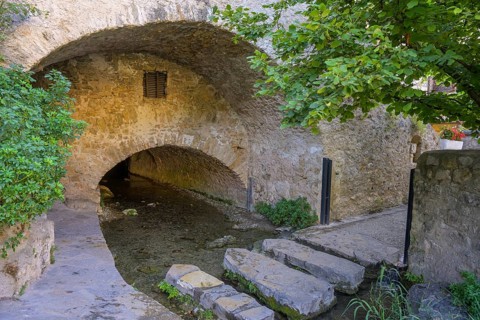 Stepping stones over a water channel, Saint-Guilhem-le-Désert, Département Hérault, France, Europe