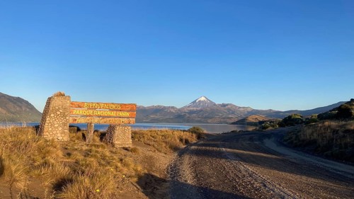 Dirt road to the entrance of Lanin National Park with the Lanin Volcano, Patagonia, Argentina,