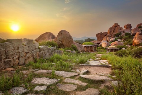Ancient ruins in Hampi on sunset. Above Hampi Bazaar, Hampi, Karnataka, India, Asia
