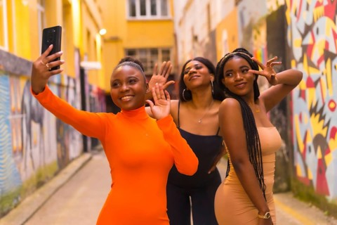 San Sebastián, Gipuzkoa Spain, February 2021: Three girls taking a selfie. Fashionable urban style