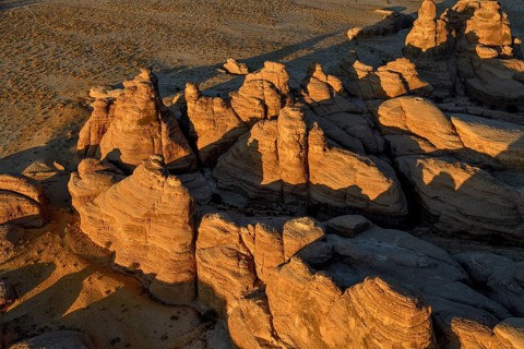 Rock landscape at Jabal Ithlib, blue hour, aerial view, Hegra or Mada'in Salih, AlUla region,