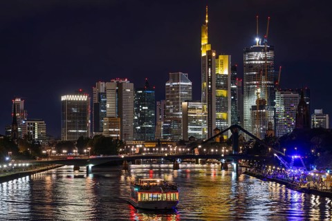 The lights of Frankfurt's banking skyline shine in the evening., Osthafen, Frankfurt am Main,